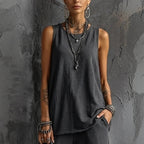 Women's sleeveless tank top and cropped ankle pants set from Plush Fashion Hub, casual two-piece outfit on a model.