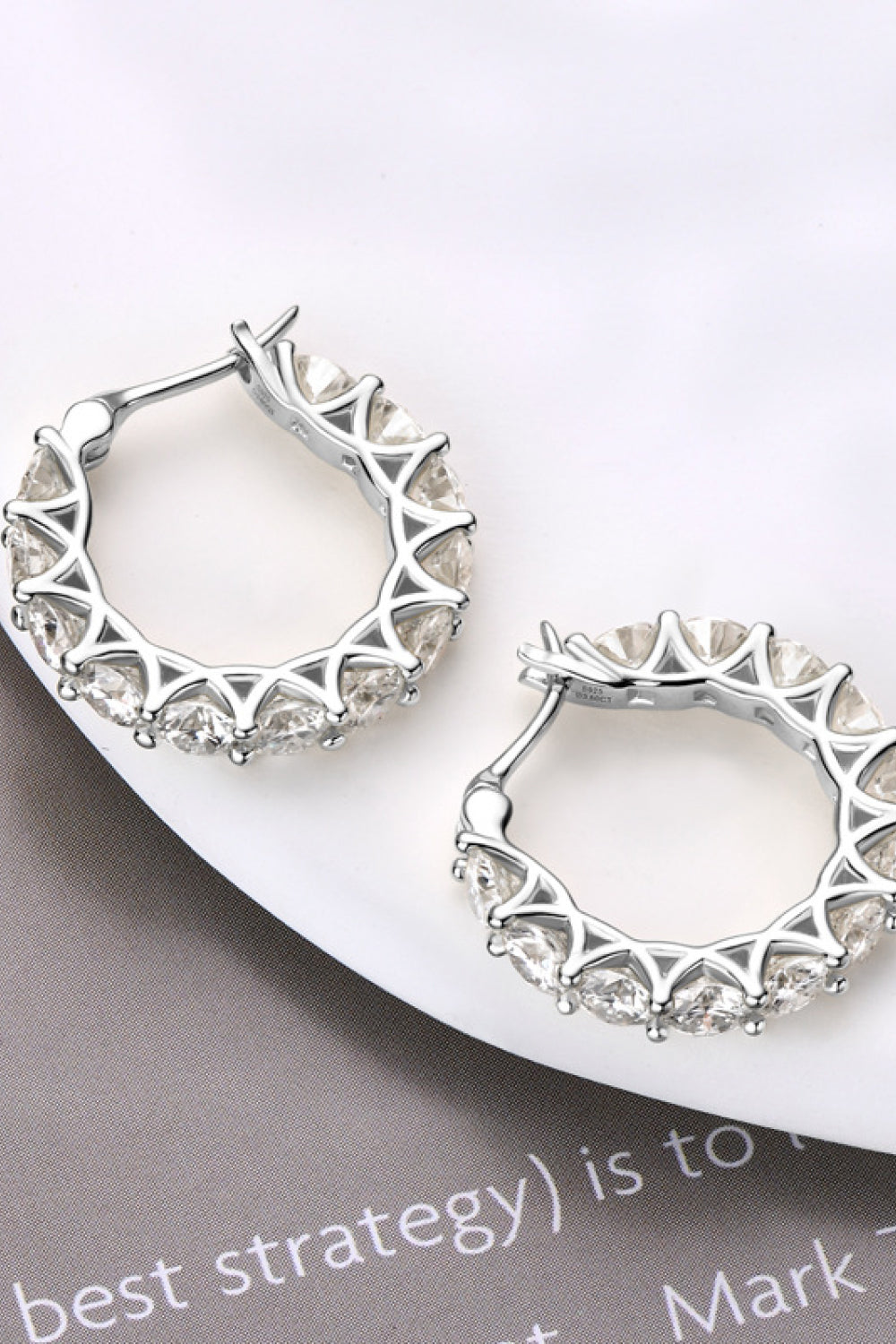 Sterling silver moissanite earrings with 7.2 carats, featuring sparkling round-cut stones in a classic dangle design.