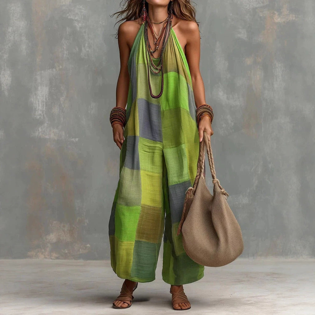 Women's plaid print jumpsuit by Plush Fashion Hub featuring sleeveless design, wide-leg style, and suspender details.