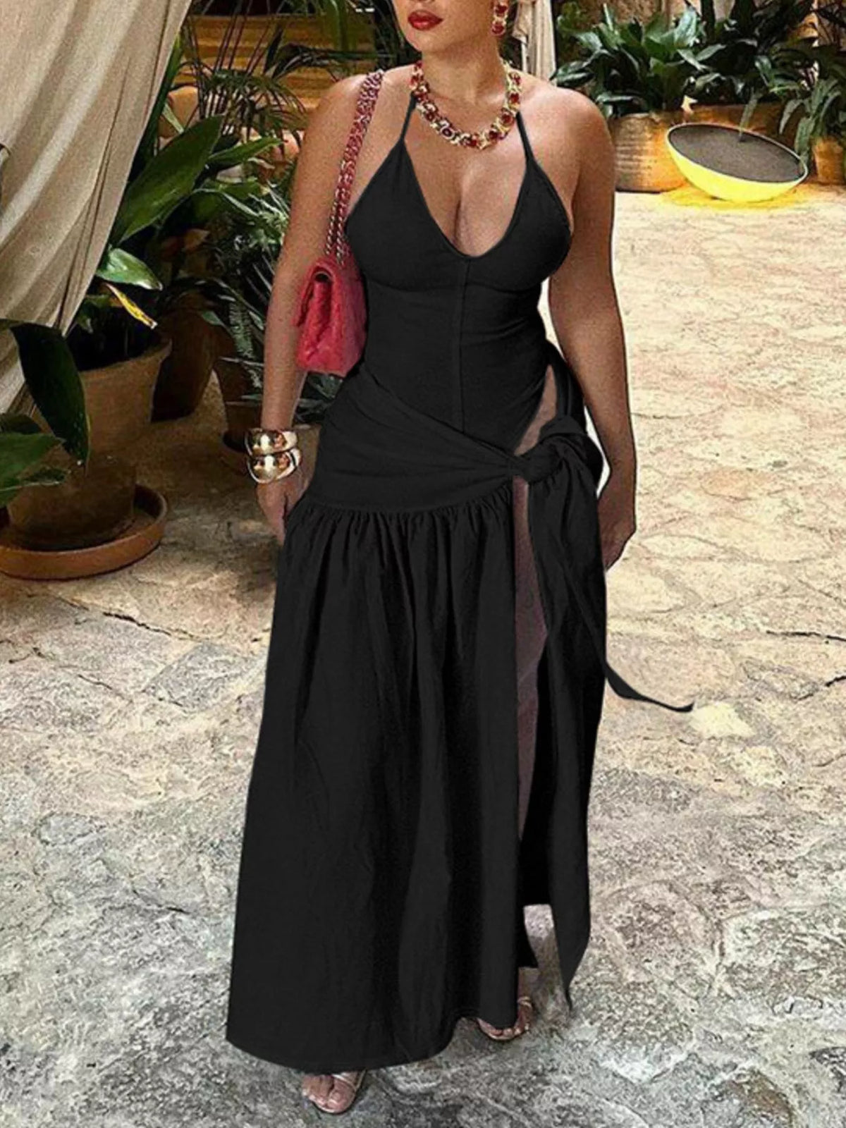 Halter neck ruched bodysuit with matching maxi skirt, two-piece set by Plush Fashion Hub, shown in black fabric with stylish fit.