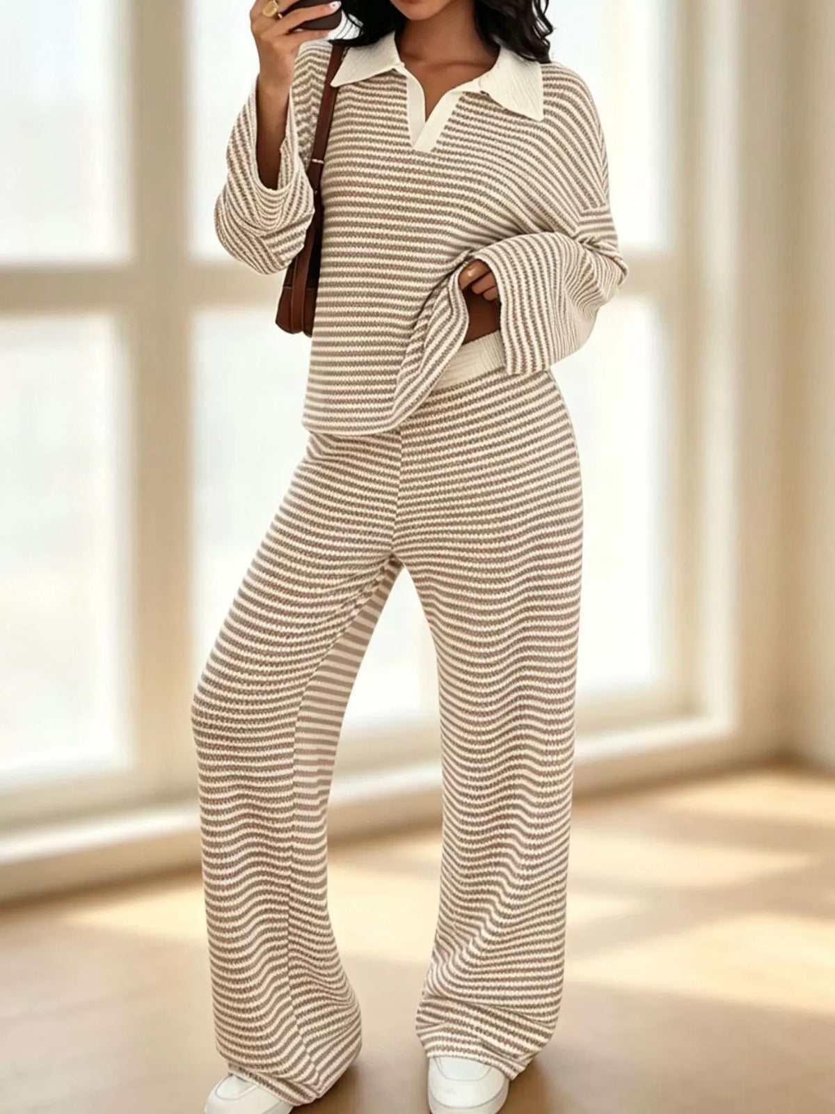 Striped long sleeve polo and wide-leg pants set by Trendsi, featuring a stylish coordinated outfit with bold stripes and comfortable fit.