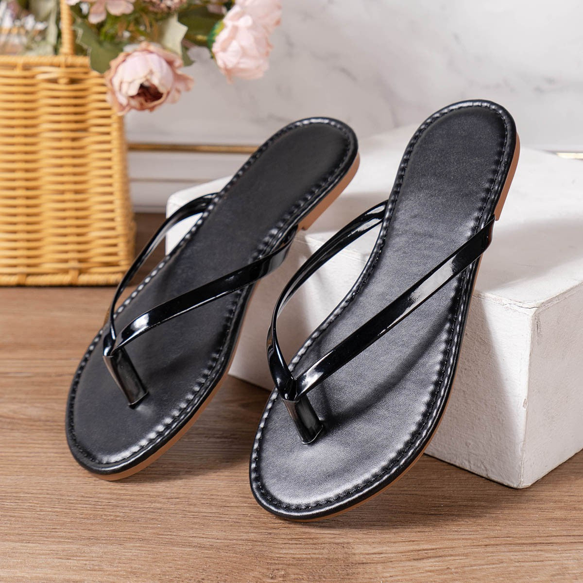 Plush Fashion Hub toe post flats sandals with cushioned straps and comfortable footbed, suitable for casual summer wear.