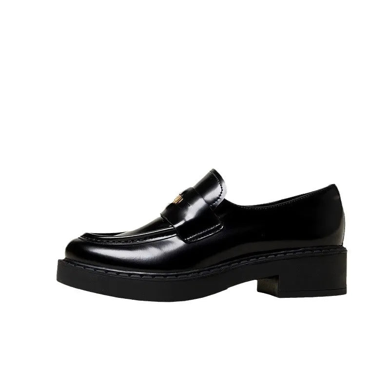 Women's round toe block heel loafers by Trendsi, stylish black shoes with a sleek design and comfortable chunky heel.