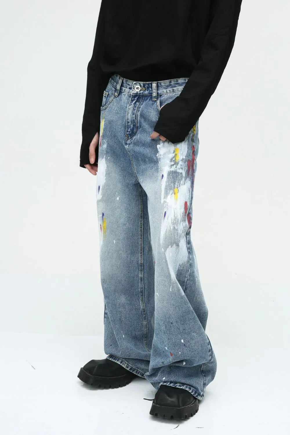 Plush Fashion Hub denim jeans with painted design and multiple pockets, showcasing a stylish casual look.