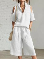 Casual short-sleeve shirt and loose shorts two-piece set by Plush Fashion Hub, model wearing lightweight, comfortable summer outfit.