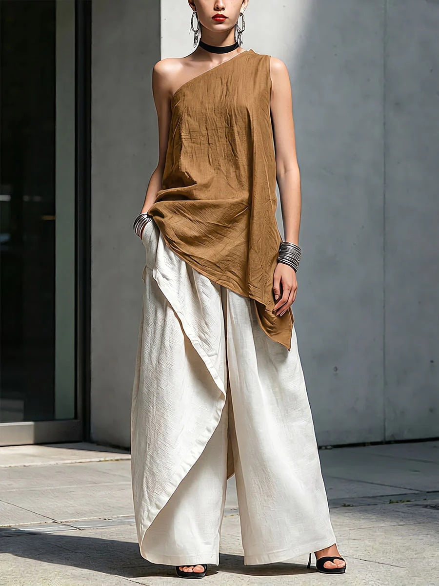 Women's one-shoulder asymmetric sleeveless top by Plush Fashion Hub, featuring a stylish design and comfortable fit.
