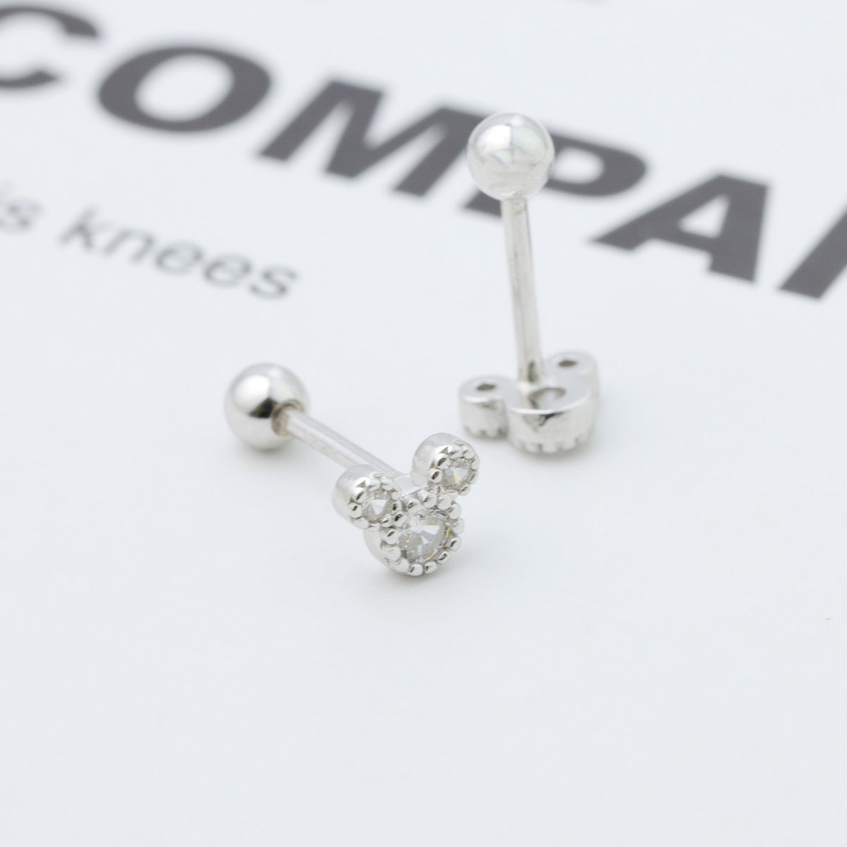 Mickey Mouse stud earrings from Plush Fashion Hub featuring cute cartoon character designs in silver-tone metal.