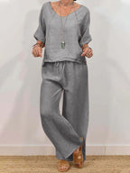 Women’s multi-color two-piece casual set with V-neck top and matching pants, stylish and comfortable from Plush Fashion Hub.