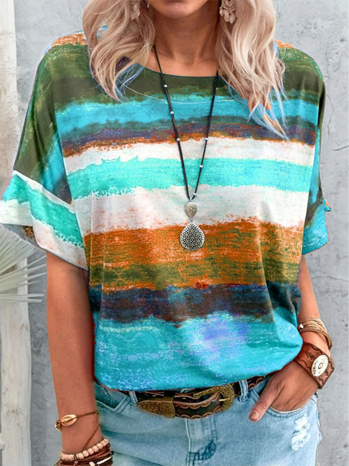 Women’s casual short sleeve T-shirt from Plush Fashion Hub with contrast round neck and relaxed fit, shown in a natural pose.