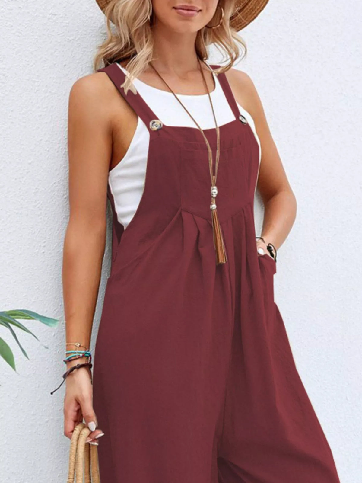 Full size casual wide-leg jumpsuit with pockets by Plush Fashion Hub, featuring a comfortable fit and stylish design.
