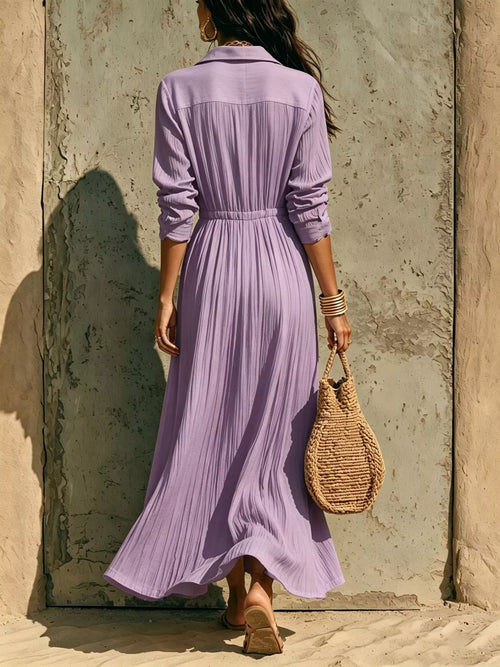Full size textured button-front long sleeve maxi dress from Trendsi, plus size, with a flowing silhouette and stylish design.