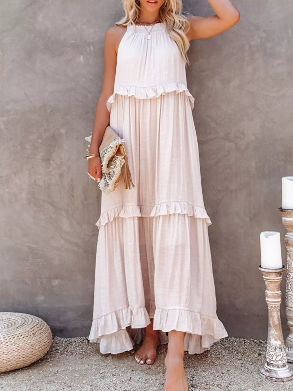Elegant ruffled tiered sleeveless maxi dress by Plush Fashion Hub, featuring flowing fabric and layered design for a stylish look.