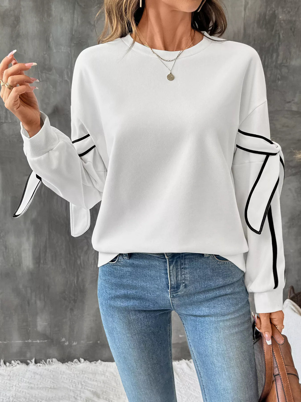 Plush Fashion Hub side striped round neck sweatshirt, casual tops with contrasting stripe details on soft fabric.