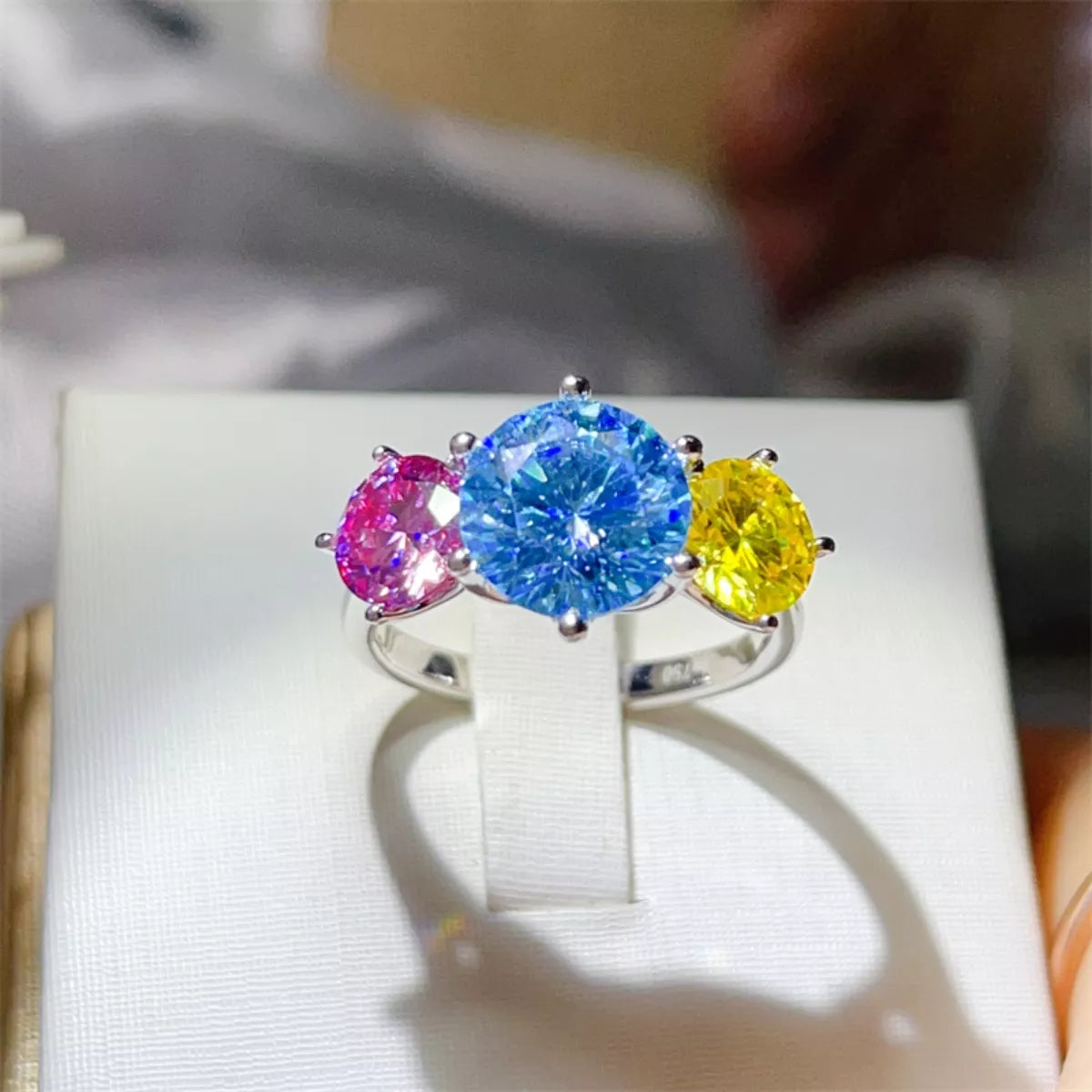Sterling silver ring with a 5-carat moissanite gemstone, featuring a sleek band design, perfect for elegant jewelry collection.