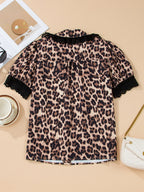 Leopard print short sleeve blouse with lace trim and button front, stylish women's top by Trendsi.