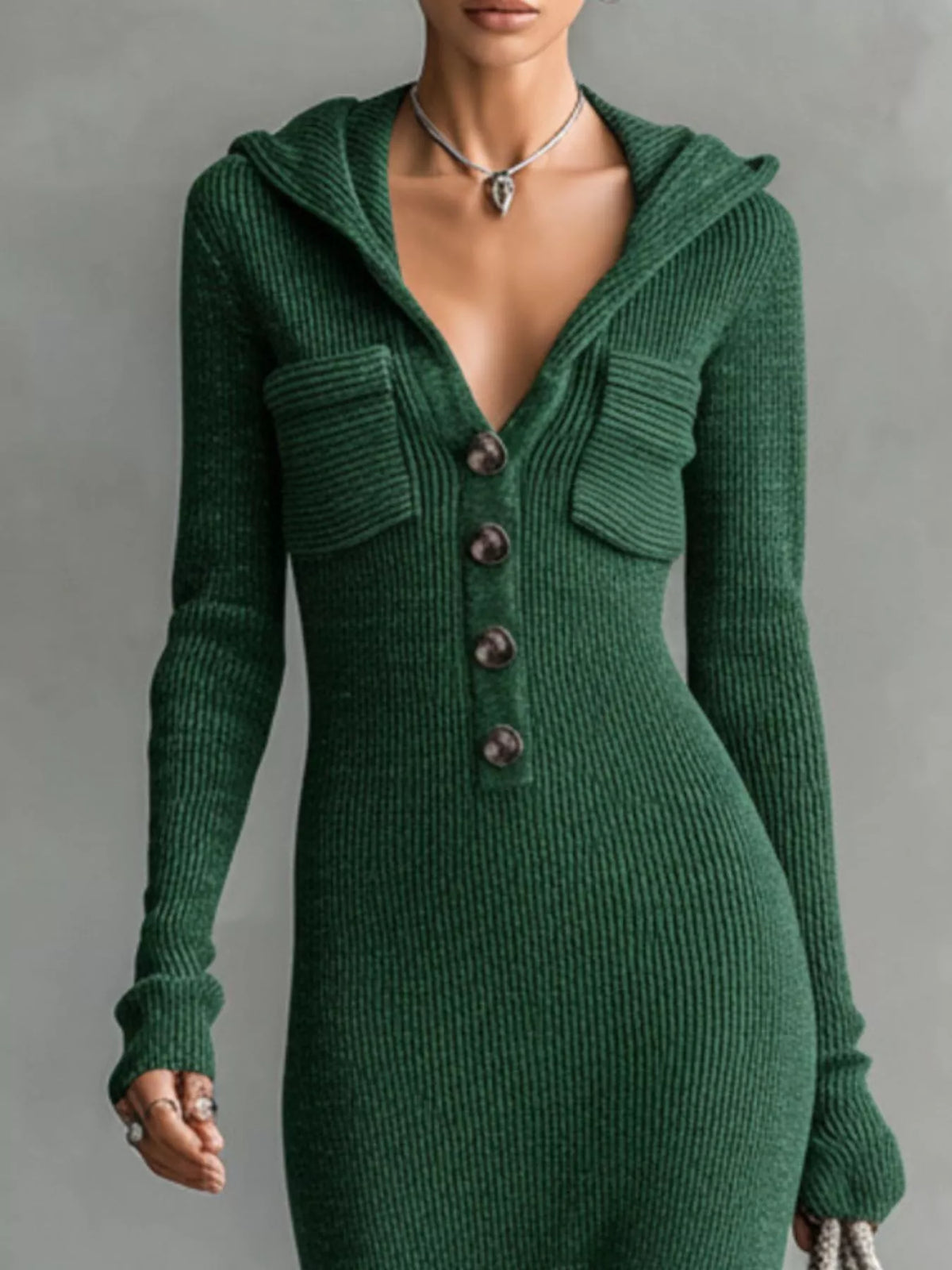 Knit hooded maxi dress by Trendsi with button placket and side pockets, featuring a cozy, stylish design for casual wear.