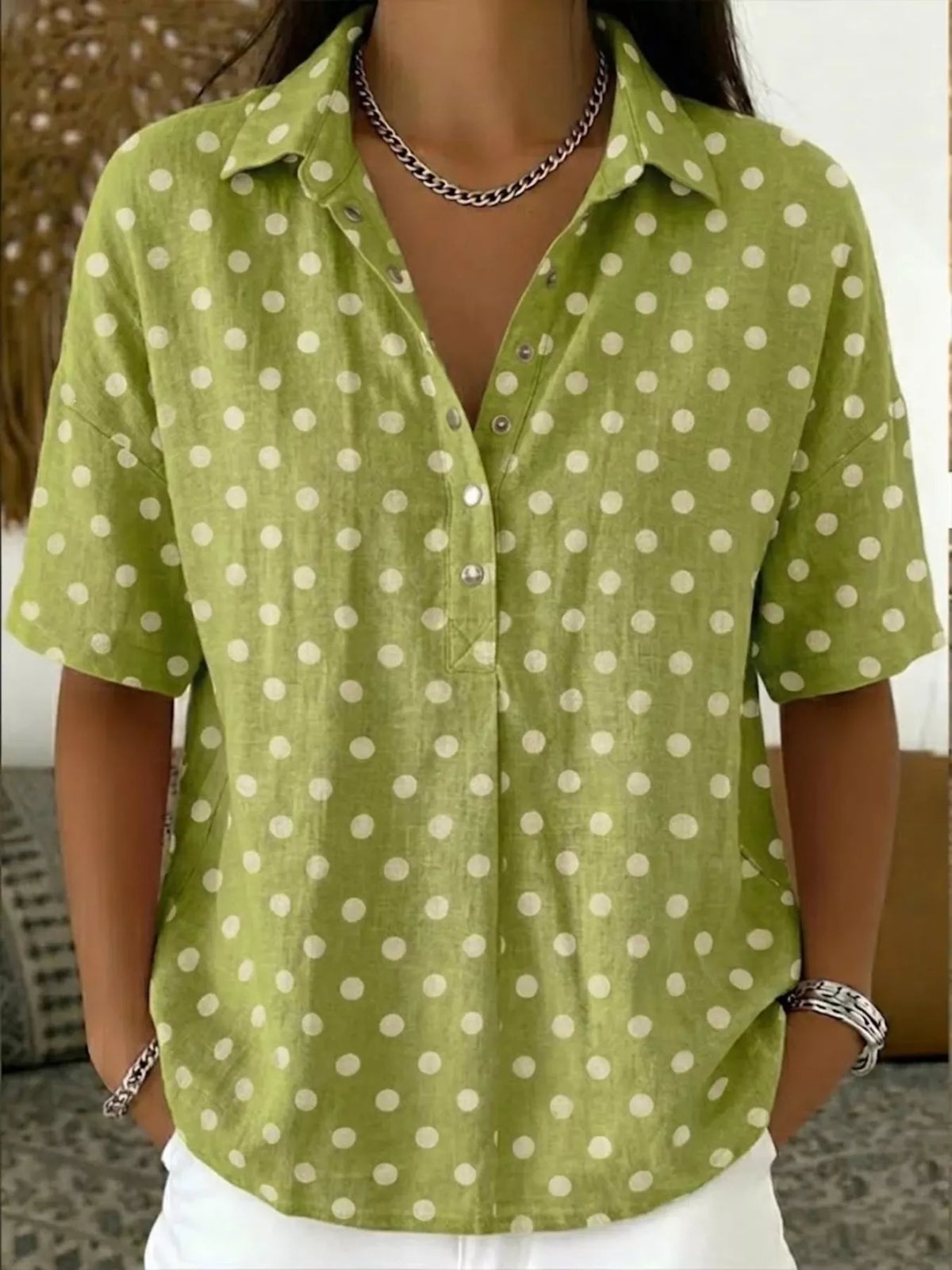 Plus size polka dot short sleeve shirt from Trendsi, featuring a casual, full-size women’s top with a playful polka dot pattern.