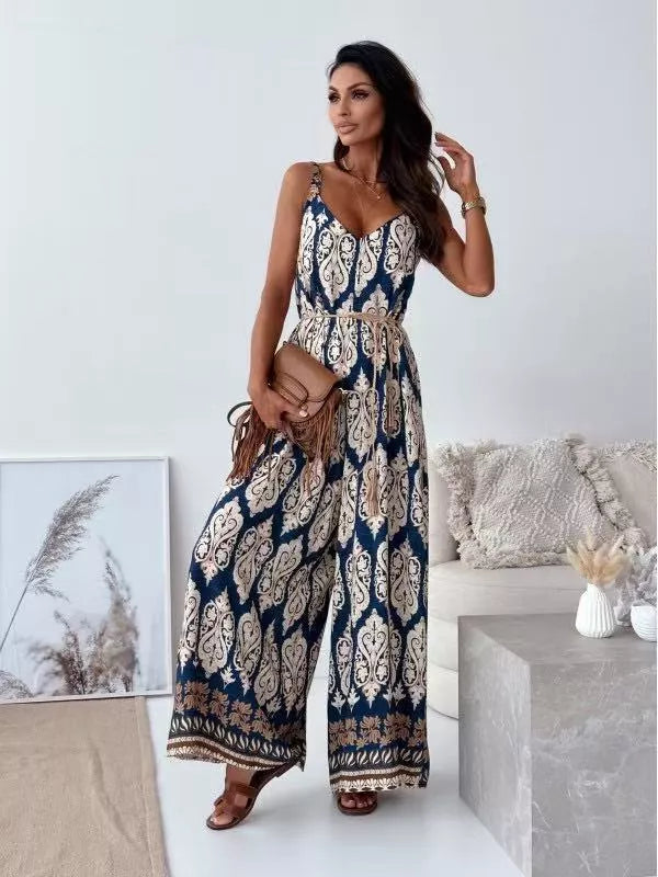 Printed spaghetti strap wide-leg jumpsuit by Plush Fashion Hub, showing the stylish sleeveless design and flowy wide-leg silhouette.