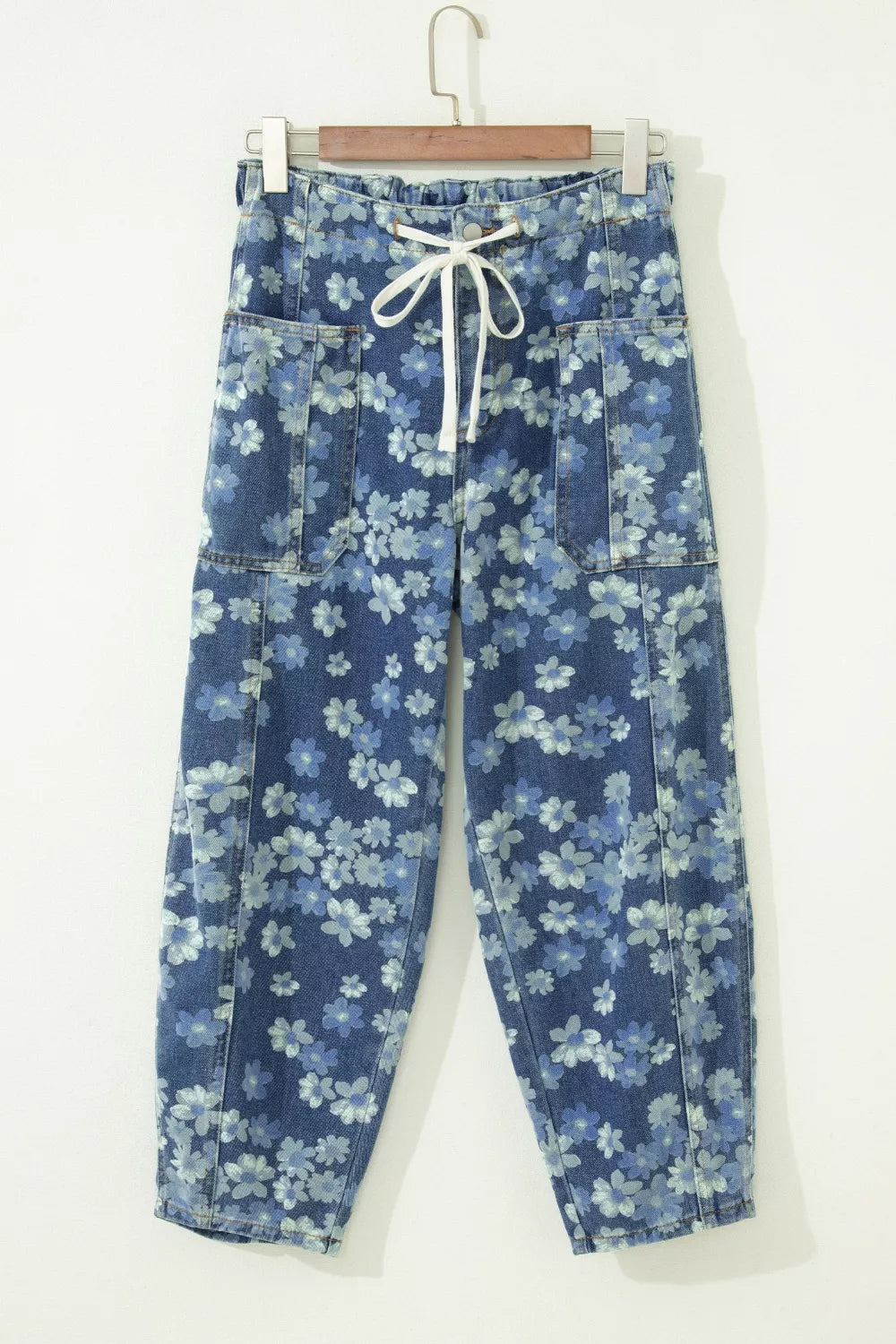 Dainty floral printed drawstring barrel jeans by Plush Fashion Hub, featuring a relaxed fit with floral design and drawstring waist.