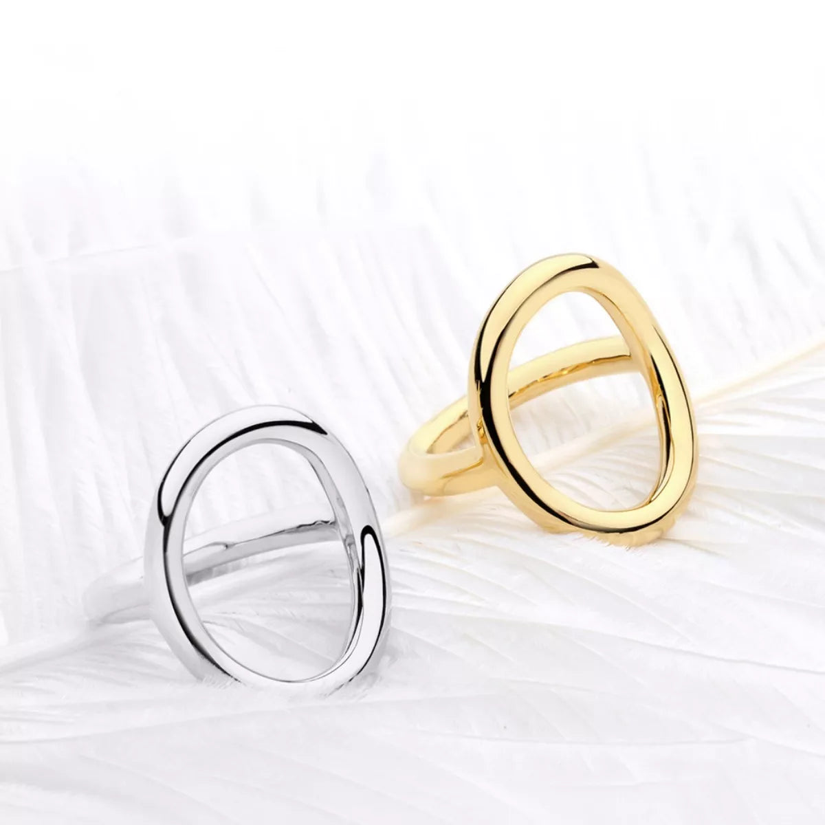 18K gold-plated copper round ring with a smooth, shiny finish, showcasing a stylish and elegant jewelry design.