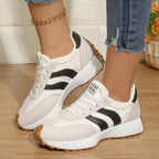 Women's round toe lace-up casual sneakers from Trendsi with comfortable PU leather, flat sole, and stylish design.