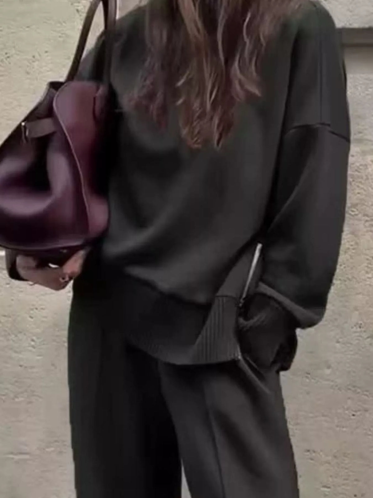 Trendsi turtleneck dropped shoulder top and matching pants set, featuring a cozy knit fabric and stylish relaxed fit.