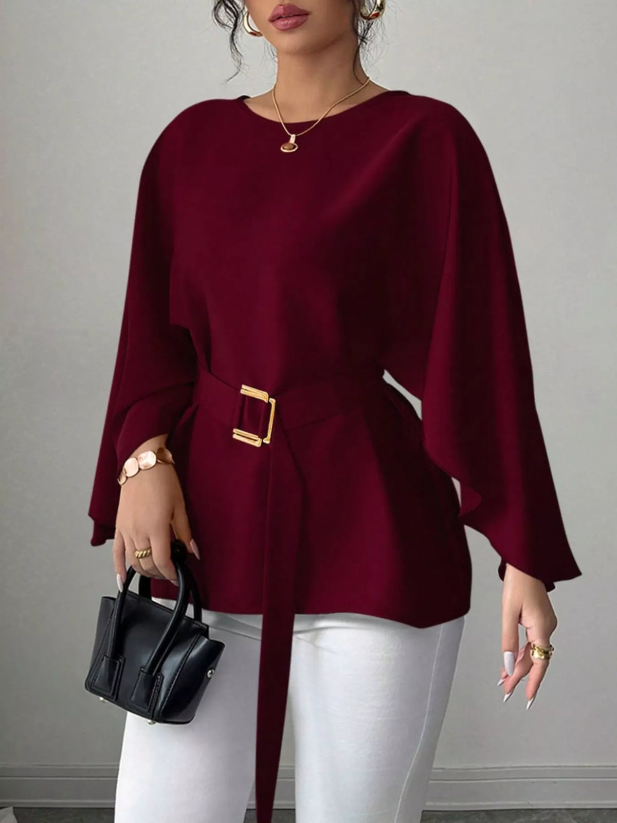 Batwing sleeve belted blouse by Plush Fashion Hub, stylish tops with flowy sleeves and a waist belt, in a fashionable design.