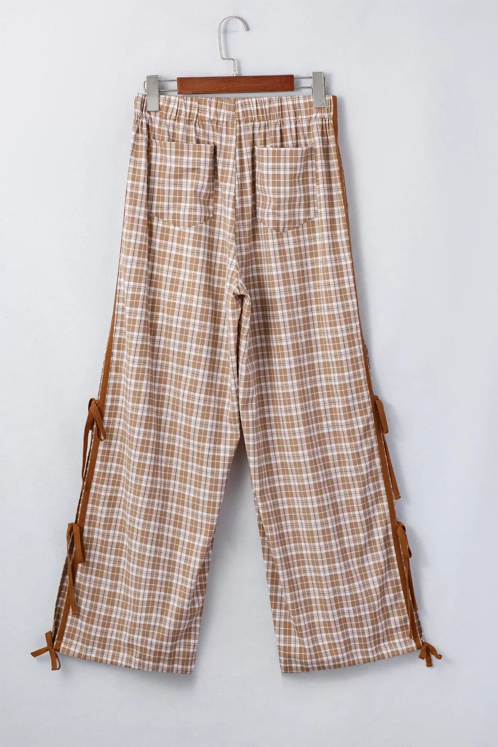 Casual plaid print pants with tie detail from Trendsi, featuring a relaxed fit and stylish pattern perfect for everyday wear.