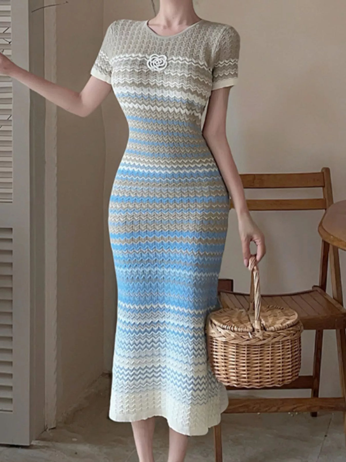 Gradient knit striped short sleeve midi dress from Trendsi, featuring a stylish color gradient and comfortable fit.