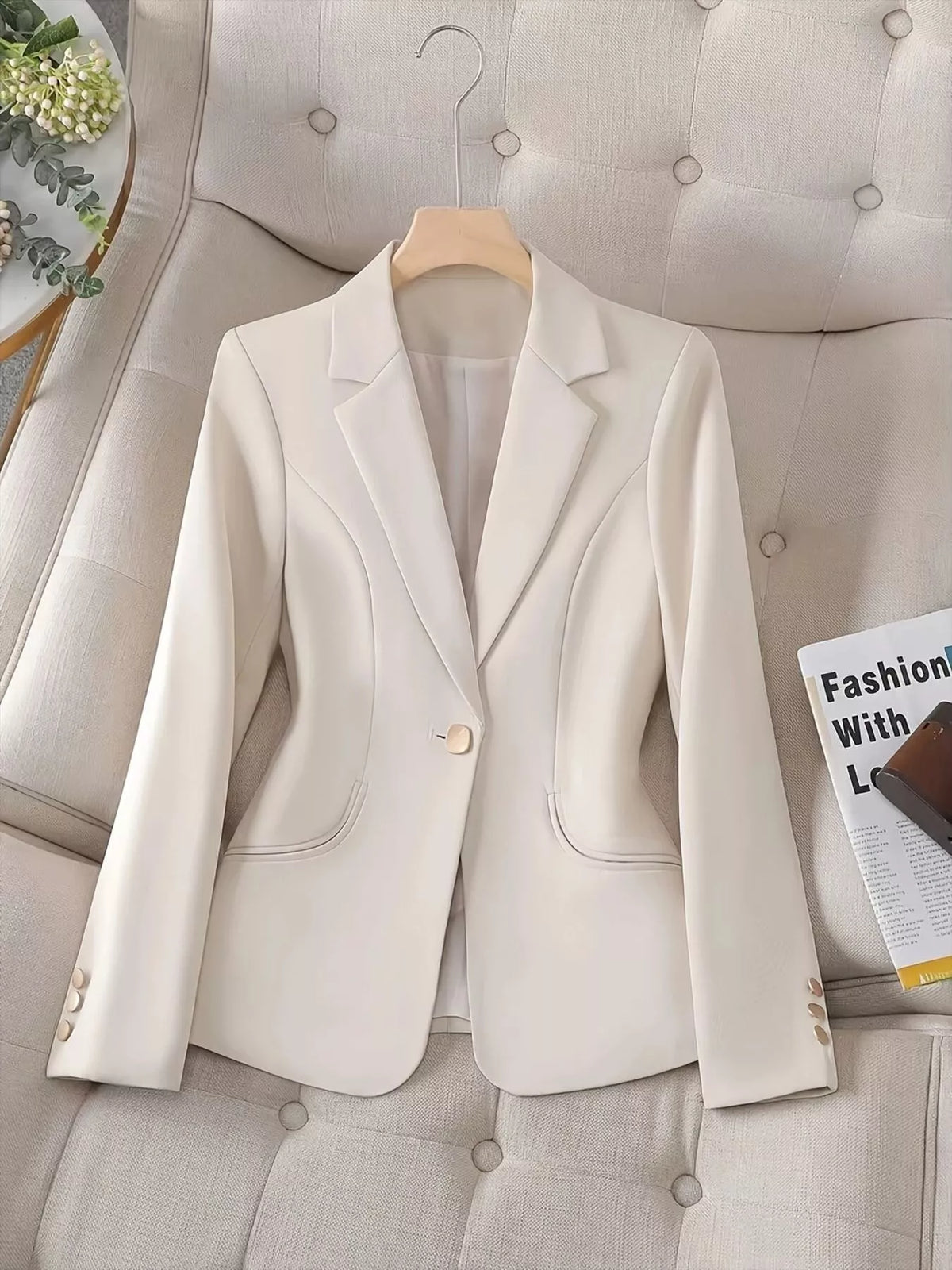 Slim-fit Trendsi single-button blazer with tailored lapels and structured design, shown on a neutral background.