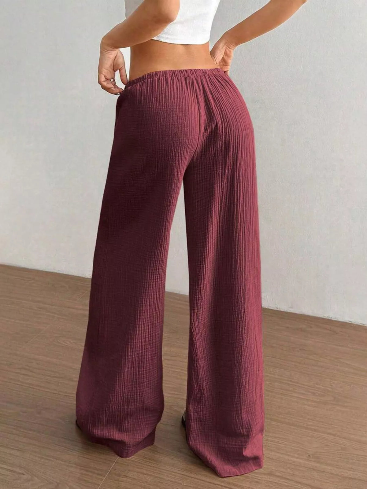 Plush Fashion Hub wide-leg drawstring pants in soft plush fabric, featuring a relaxed fit and comfortable waistband.