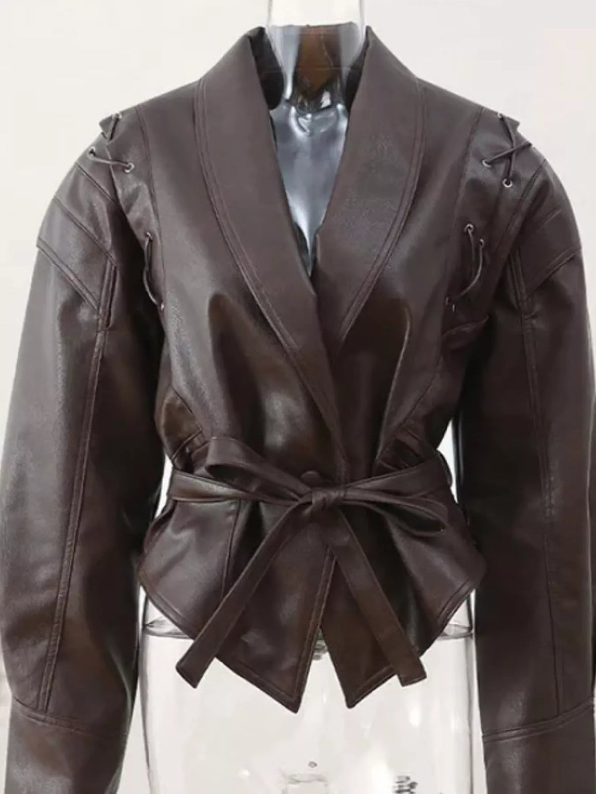 Women's leather belted jacket with shawl collar, featuring a stylish design from Trendsi, shown in a sleek front view image.
