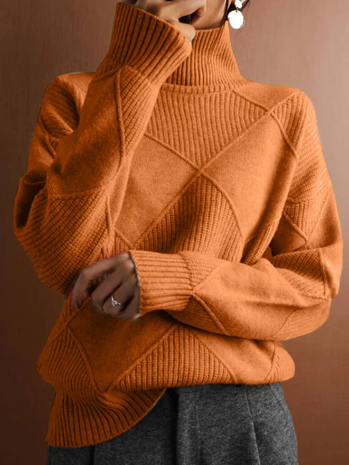 Argyle pattern turtleneck sweater by Trendsi, featuring a classic diamond design in warm knit fabric, displayed on a neutral background.