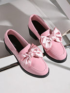 Women's plush fashion hub bowtie round toe low heel pumps in wide size, casual PU footwear with stylish design.