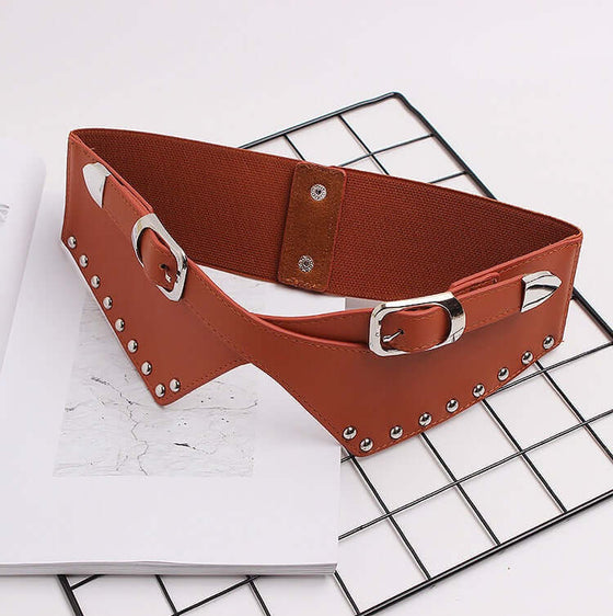 Women's Decorative Elastic Rivets, Wide BeltsTransform any outfit with our Women's Belts. Made with durable PU material, these simple yet stylish belts feature elastic waist closure and decorative rivets for a BeltsPlush Fashions ShopPlush Fashion ShopDecorative Elastic Rivets, Wide Belts