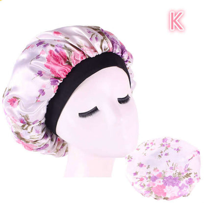 Beauty print Satin silk Bonnet sleep night capTransform your sleep routine with our Beauty print Satin silk Bonnet! Made with a luxurious blend of polyester and spandex, this bonnet is perfect for all seasons. SBonnetPlush Fashion ShopPlush Fashion ShopBeauty print Satin silk Bonnet sleep night cap