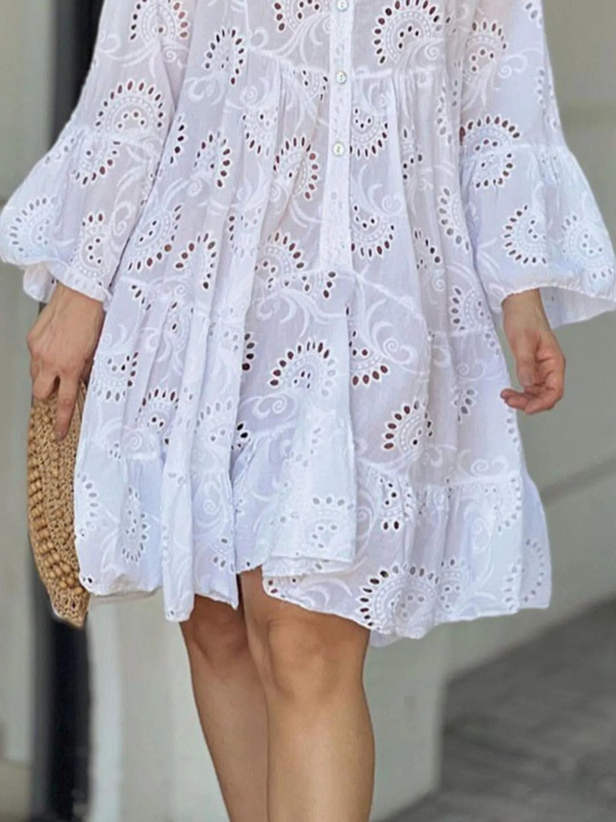 Plus size eyelet ruffled hem tiered dress by Trendsi featuring a full-length design with flowy layers and playful ruffle details.