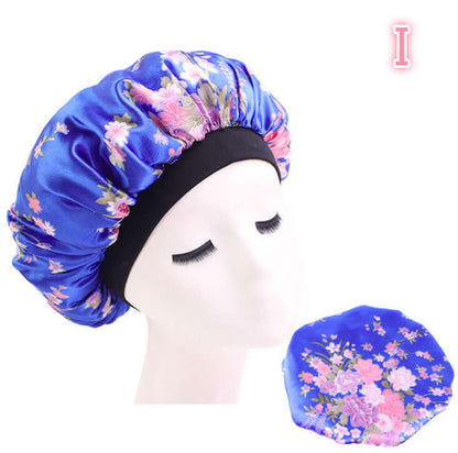 Beauty print Satin silk Bonnet sleep night capTransform your sleep routine with our Beauty print Satin silk Bonnet! Made with a luxurious blend of polyester and spandex, this bonnet is perfect for all seasons. SBonnetPlush Fashion ShopPlush Fashion ShopBeauty print Satin silk Bonnet sleep night cap