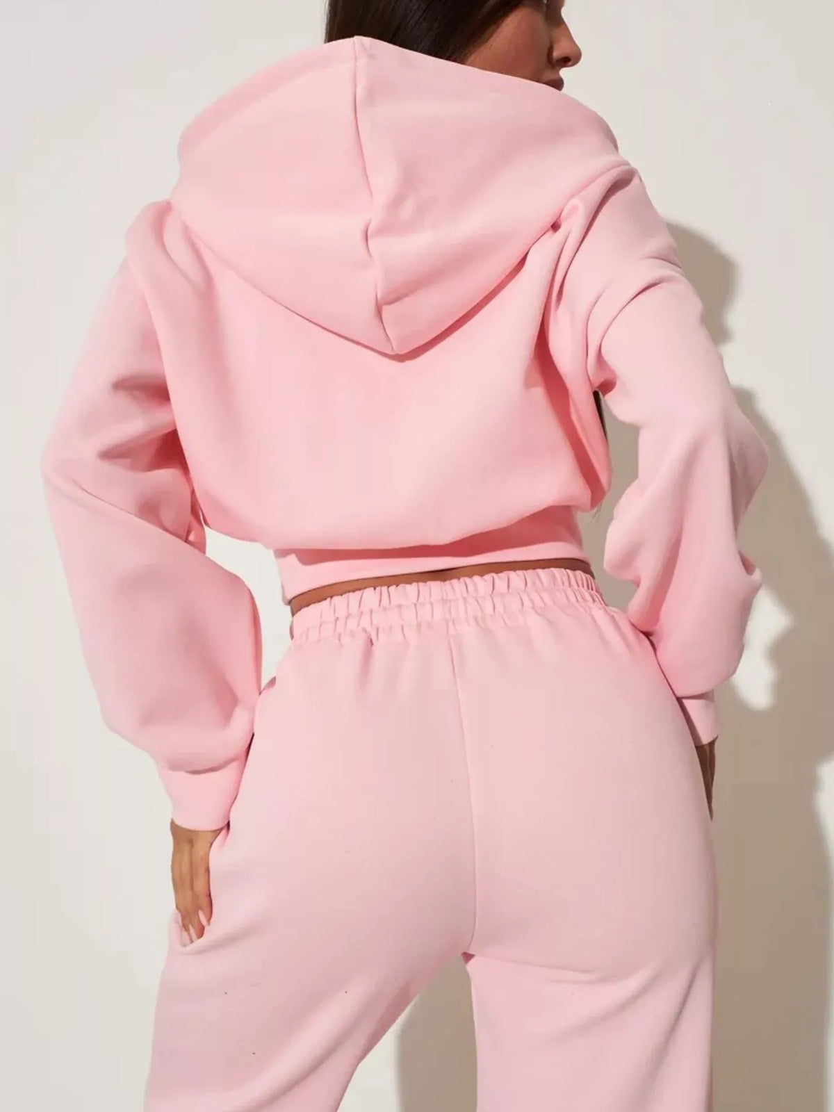 Plush Fashion Hub zip-up hoodie and wide-leg pants loungewear set, featuring comfortable fabric and casual style.