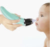 Child receiving gentle nasal suction with electric nasal aspirator, featuring soft silicone tip for comfort.