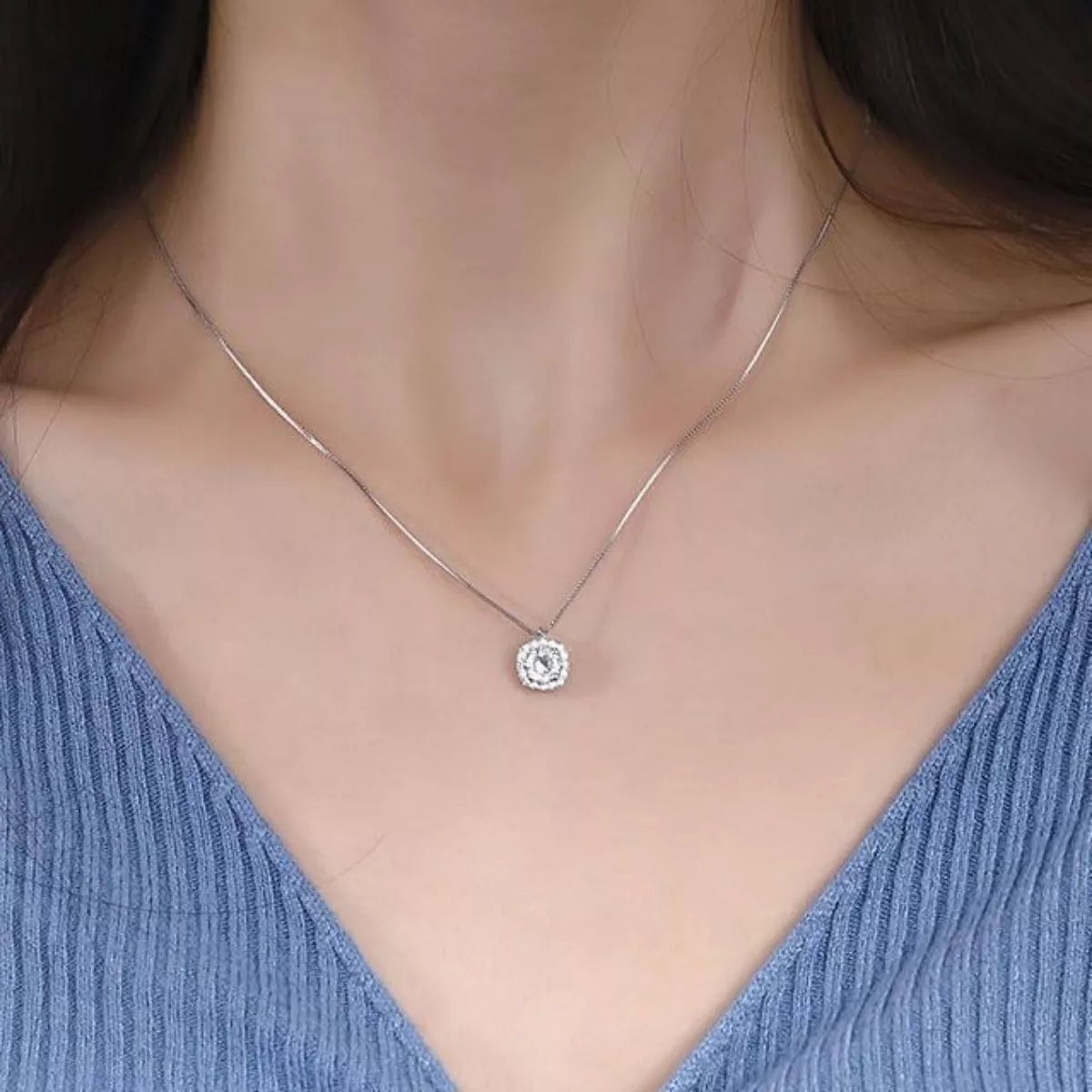 Sterling silver zircon pendant necklace with a delicate chain, showcasing a sparkling zircon stone on a Plush Fashion Hub necklace.