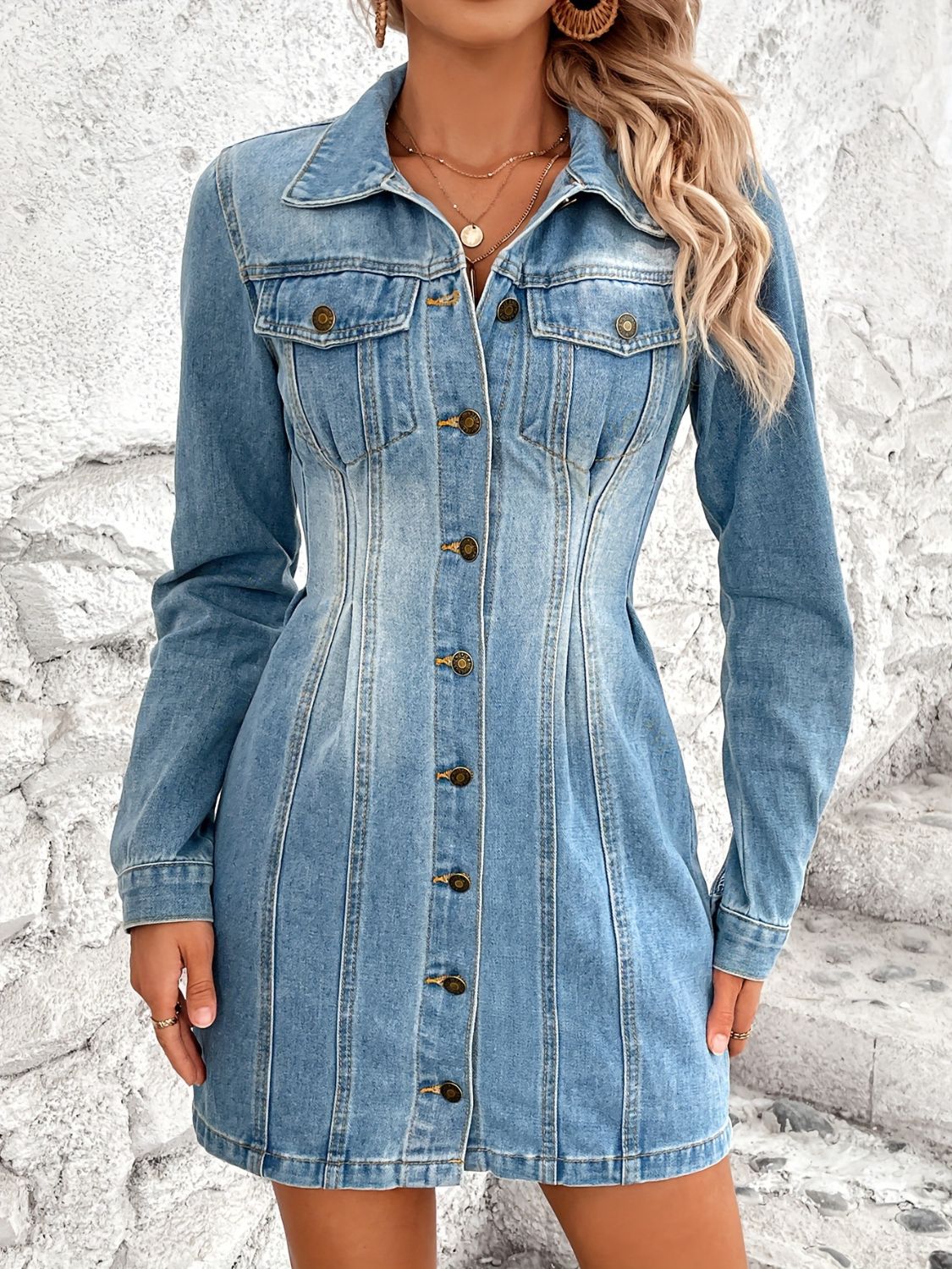 Denim long sleeve button-up dress with pockets from Plush Fashion Hub, casual fashion clothing, front view.