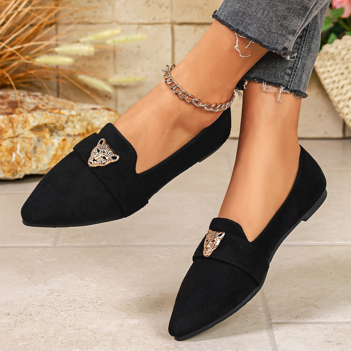 Point toe slip-on footwear by Trendsi, sleek and stylish shoes with a smooth finish, ideal for casual or dressy looks.