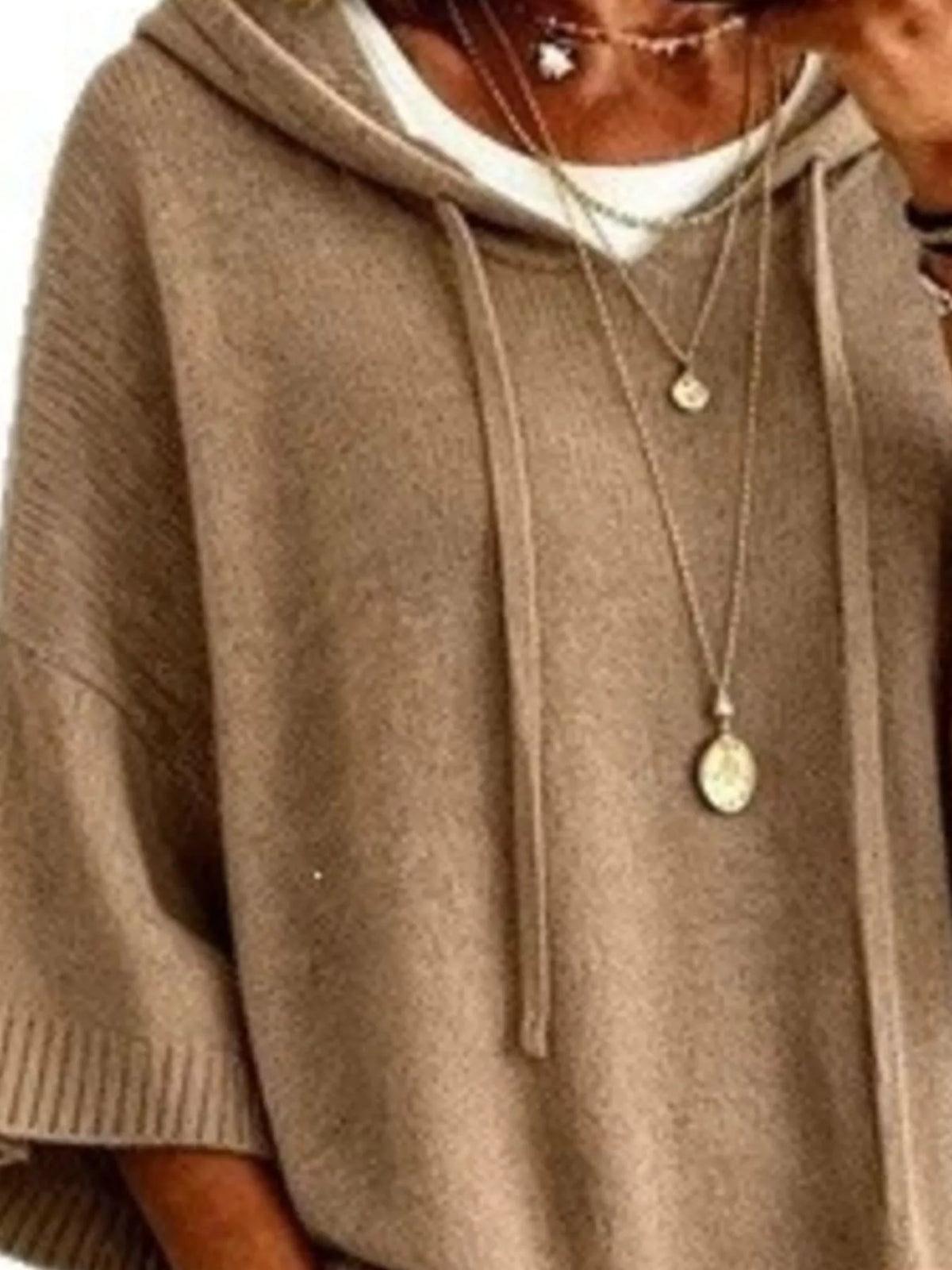 Plus size full-size drawstring hoodie sweater with 3/4 sleeves, featuring a hood and casual fit from Trendsi.