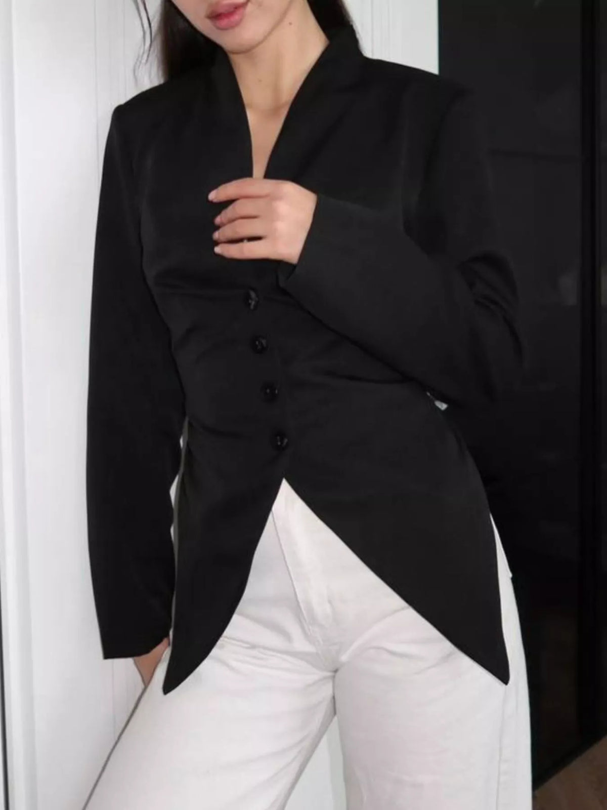 Slim-fit asymmetric hem blazer by Trendsi, featuring tailored design and stylish cut, displayed on a neutral background