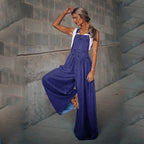 Women’s wide leg denim overalls from FitiqueFit featuring casualwear style, with adjustable straps and front pockets.