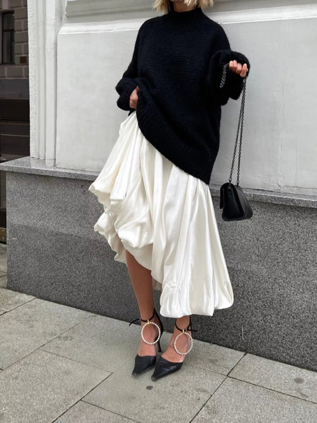 Flowy satin maxi skirt from Plush Fashion Hub featuring a smooth, shiny fabric and elegant drape, perfect for stylish outfits.
