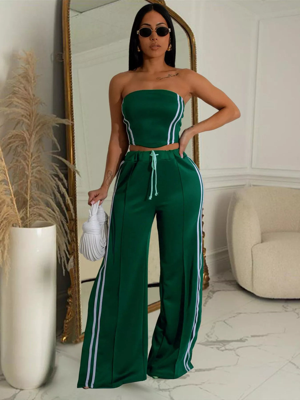 Sleeveless tube top and wide-leg pants set from Plush Fashion Hub, featuring a stylish, coordinated casual outfit.