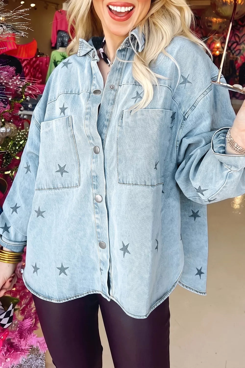 Light wash denim jacket for women with star print from Trendsi, featuring classic style and button closure.