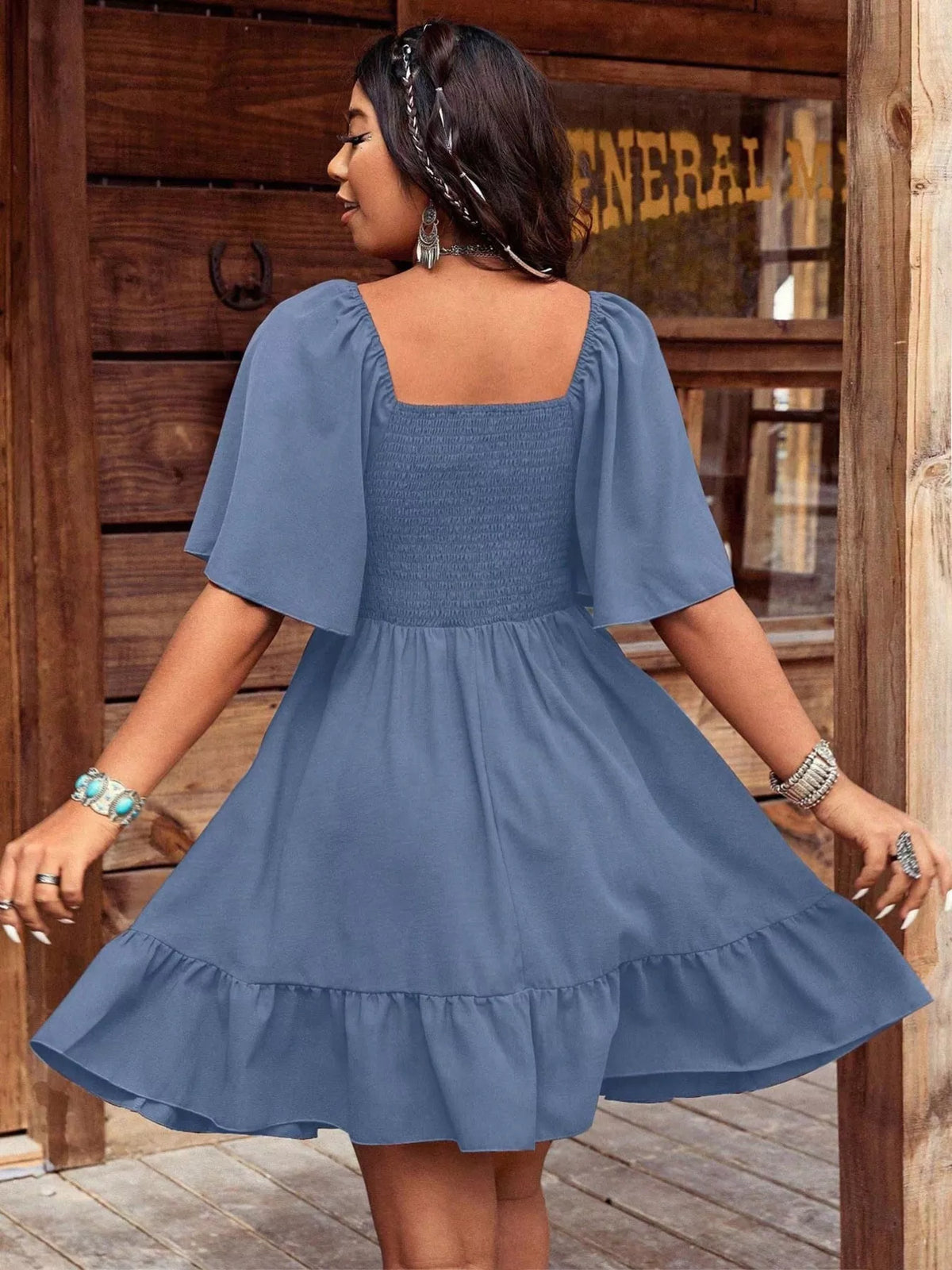 Embroidered Flutter Sleeve Mini Dress by Plush Fashion Hub featuring intricate embroidery and lightweight fabric.